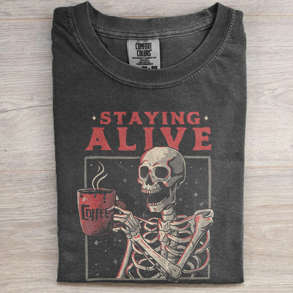 Staying Alive Coffee Tee – Funny Skeleton Halloween Comfort Colors Shirt