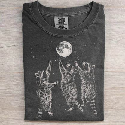 Three Raccoons Playing Under Moonlight T-Shirt